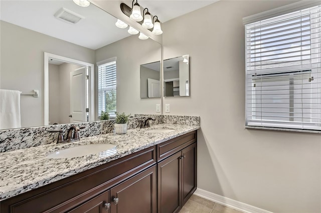 1821 Cherry Walk Rd, Lutz, FL 33558 - bathroom with double vanity, baseboards, and tile patterned floors