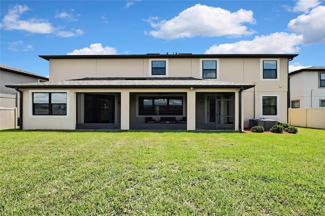 1821 Cherry Walk Rd, Lutz, FL 33558 - rear view of house featuring a sunroom, a jacuzzi, stucco siding, and central AC