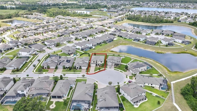 1821 Cherry Walk Rd, Lutz, FL 33558 - aerial view of property and surrounding area with nearby suburban area, a nearby body of water, and property boundaries highlighted