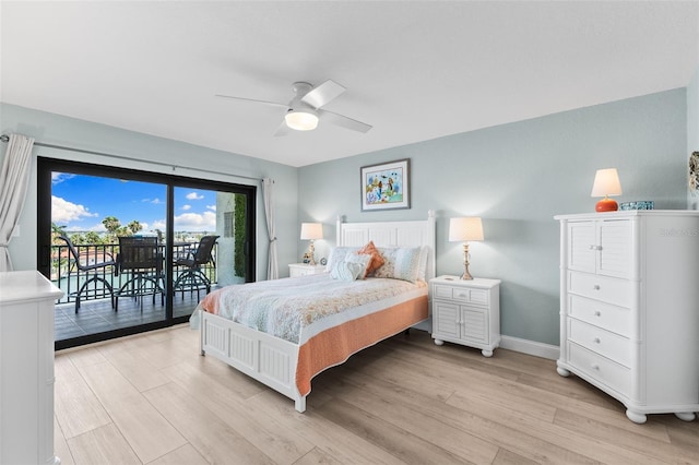12525 3rd St E Unit 303, Treasure Island, FL 33706 - bedroom with access to outside, light wood-style floors, baseboards, and a ceiling fan