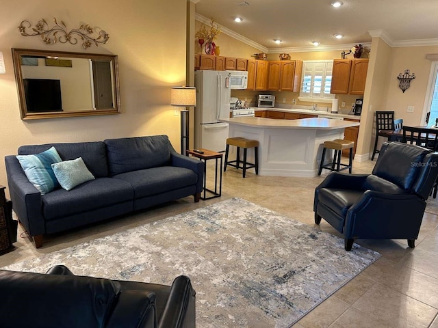310 Knoll Pl, The Villages, FL 32162 - living room featuring crown molding, light tile patterned flooring, and recessed lighting