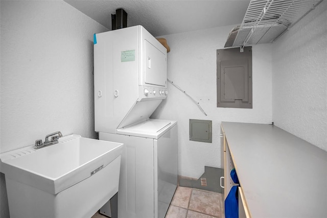 24 Gulf Blvd Unit 1C, Indian Rocks Beach, FL 33785 - laundry room with stacked washer / drying machine and electric panel