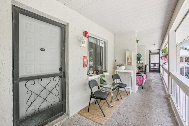 20921 Haulover Cv Unit 8, Lutz, FL 33558 - view of exterior entry featuring stucco siding