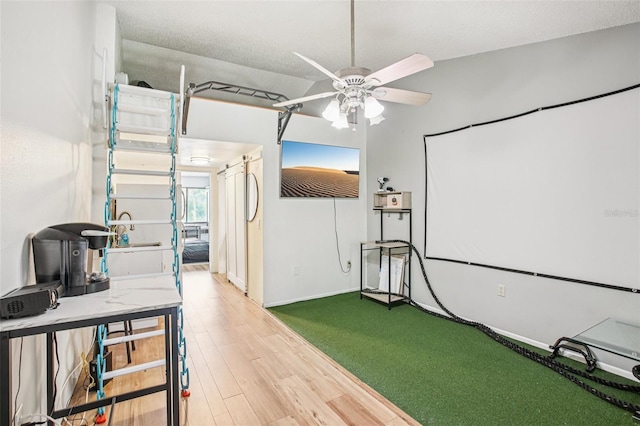 20921 Haulover Cv Unit 8, Lutz, FL 33558 - interior space featuring a ceiling fan, wood finished floors, and baseboards