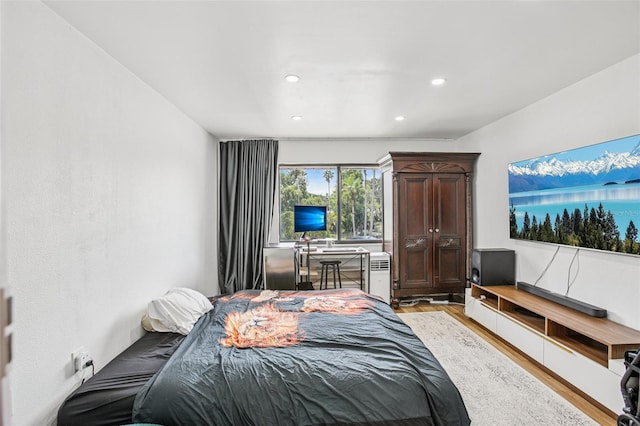 20921 Haulover Cv Unit 8, Lutz, FL 33558 - bedroom with light wood-type flooring and recessed lighting