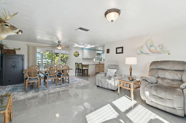 13323 Susan Dr, Hudson, FL 34667 - living area featuring ceiling fan