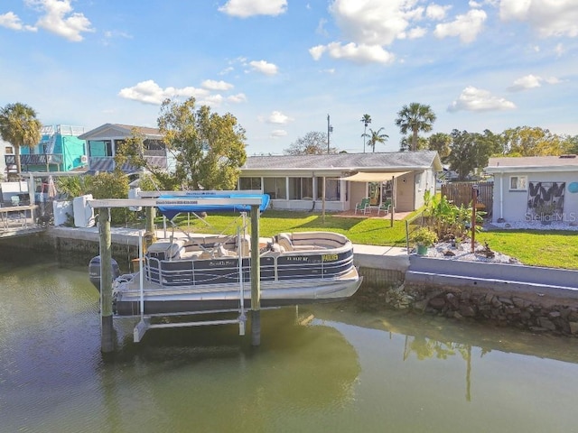 13323 Susan Dr, Hudson, FL 34667 - dock featuring boat lift and a water view
