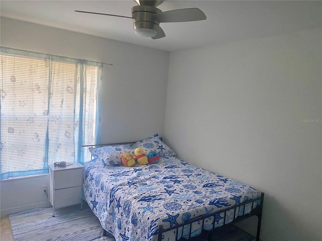 1602 Taylor Lake Cir, Largo, FL 33778 - bedroom featuring ceiling fan and wood finished floors