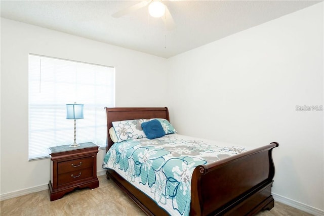 1602 Taylor Lake Cir, Largo, FL 33778 - bedroom with light colored carpet and a ceiling fan