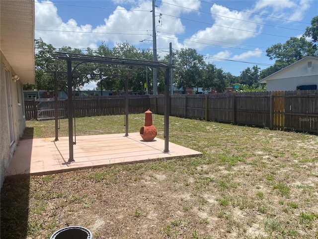 1602 Taylor Lake Cir, Largo, FL 33778 - fenced backyard with a patio and a pergola