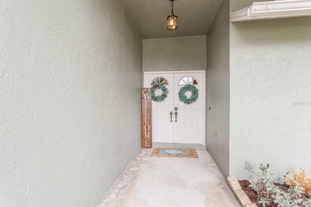 8549 Pinafore Dr, New Port Richey, FL 34653 - doorway to property with stucco siding