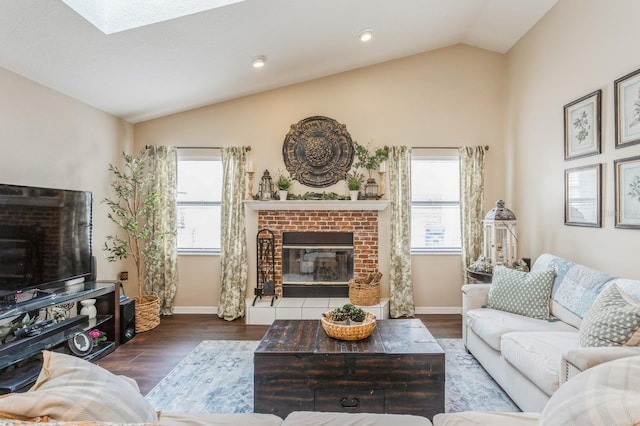 8549 Pinafore Dr, New Port Richey, FL 34653 - living room with a brick fireplace, lofted ceiling, wood finished floors, and baseboards
