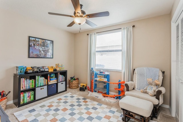 8549 Pinafore Dr, New Port Richey, FL 34653 - sitting room with ceiling fan, carpet flooring, and baseboards