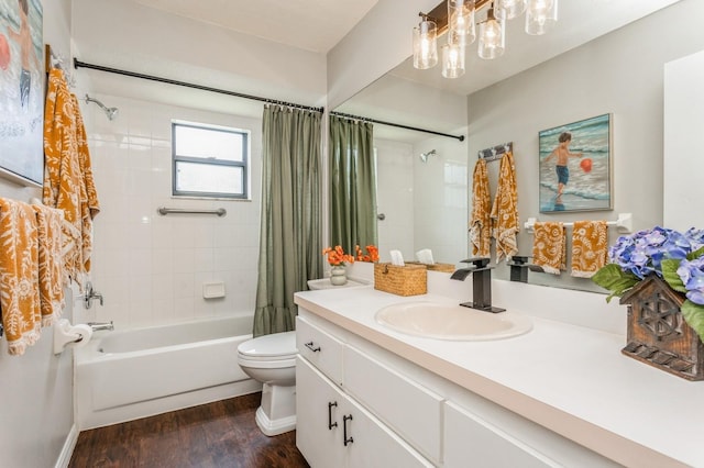 8549 Pinafore Dr, New Port Richey, FL 34653 - full bathroom with wood finished floors, shower / bathtub combination with curtain, vanity, and toilet