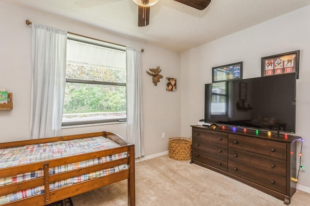 8549 Pinafore Dr, New Port Richey, FL 34653 - bedroom with light colored carpet and baseboards