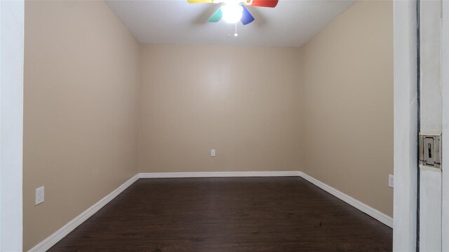 9752 Trumpet Vine Loop, Trinity, FL 34655 - empty room featuring a ceiling fan, dark wood-type flooring, and baseboards