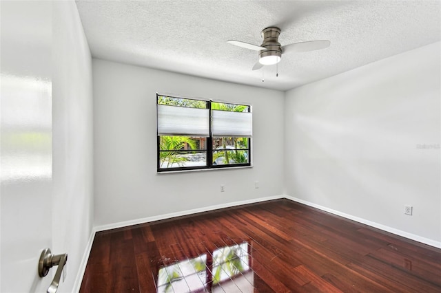 9142 Oakwood Ln, Seminole, FL 33776 - spare room with hardwood / wood-style flooring, ceiling fan, baseboards, and a textured ceiling