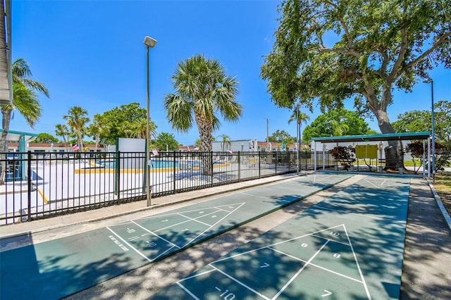 9142 Oakwood Ln, Seminole, FL 33776 - view of home's community with shuffleboard