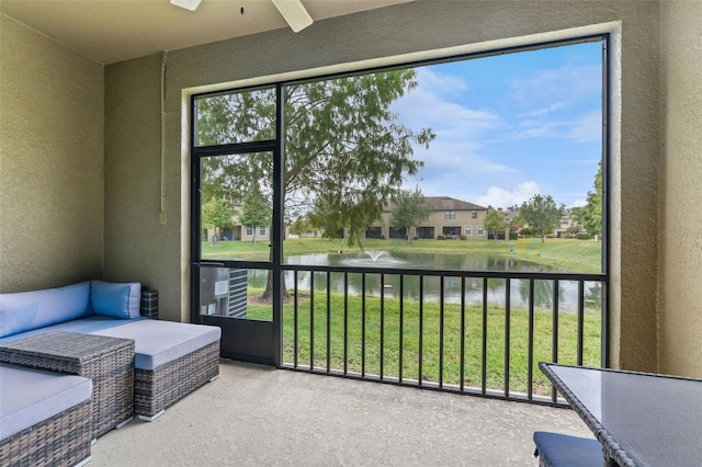 5153 Bay Isle Cir, Clearwater, FL 33760 - sunroom / solarium featuring a water view and plenty of natural light
