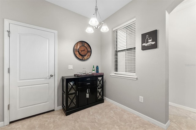 5153 Bay Isle Cir, Clearwater, FL 33760 - corridor featuring light tile patterned flooring and baseboards