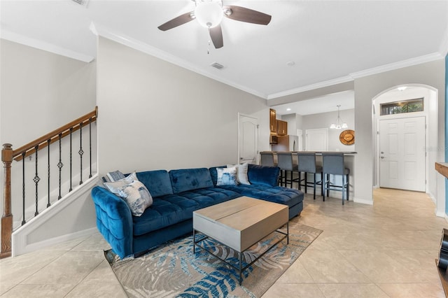 5153 Bay Isle Cir, Clearwater, FL 33760 - living room featuring crown molding, ceiling fan, light tile patterned flooring, stairway, and baseboards