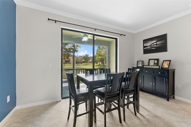 5153 Bay Isle Cir, Clearwater, FL 33760 - dining area with ornamental molding, baseboards, and light tile patterned floors