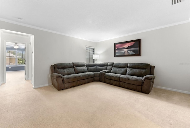 5153 Bay Isle Cir, Clearwater, FL 33760 - living room with light carpet, crown molding, baseboards, and a ceiling fan