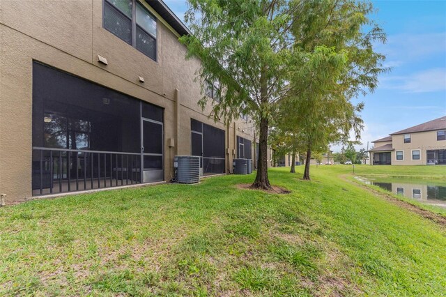 5153 Bay Isle Cir, Clearwater, FL 33760 - view of green lawn with cooling unit