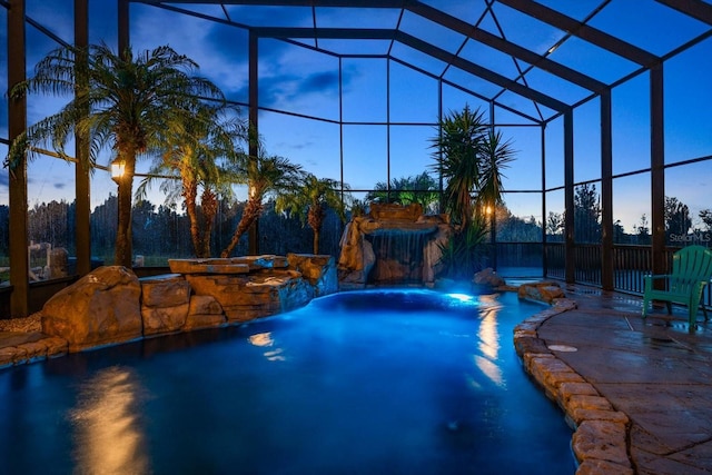 3397 Bluefish Dr, Hernando Beach, FL 34607 - swimming pool featuring glass enclosure, a patio area, and a hot tub
