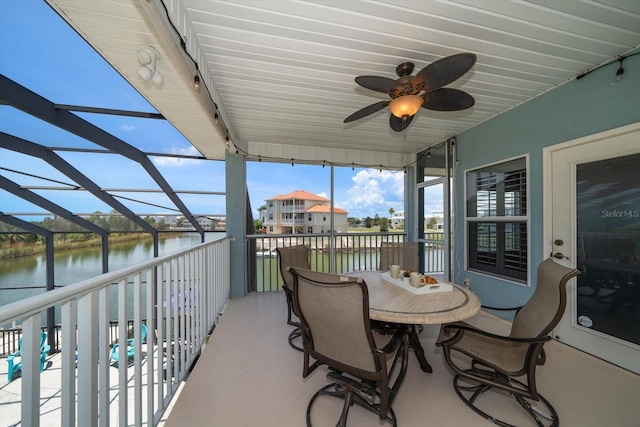 3397 Bluefish Dr, Hernando Beach, FL 34607 - sunroom with a water view and ceiling fan