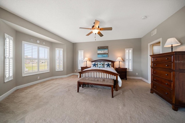 3397 Bluefish Dr, Hernando Beach, FL 34607 - bedroom featuring light colored carpet and a ceiling fan