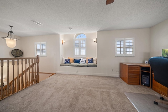 3397 Bluefish Dr, Hernando Beach, FL 34607 - unfurnished office with carpet floors, a textured ceiling, and a ceiling fan