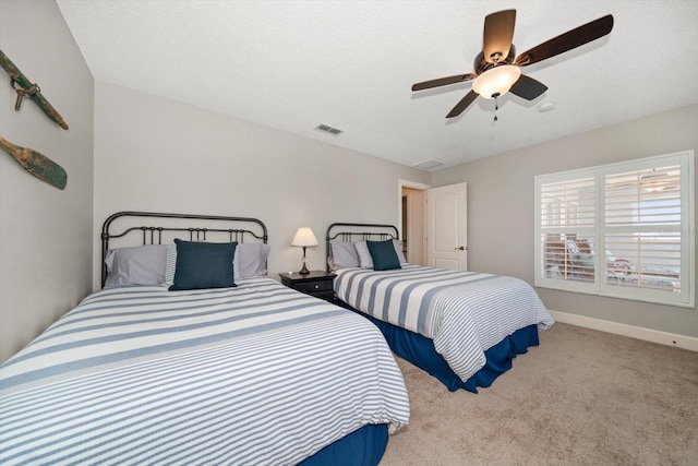 3397 Bluefish Dr, Hernando Beach, FL 34607 - bedroom with carpet and ceiling fan