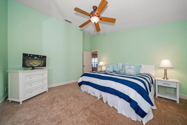 3397 Bluefish Dr, Hernando Beach, FL 34607 - bedroom with carpet, ceiling fan, and vaulted ceiling