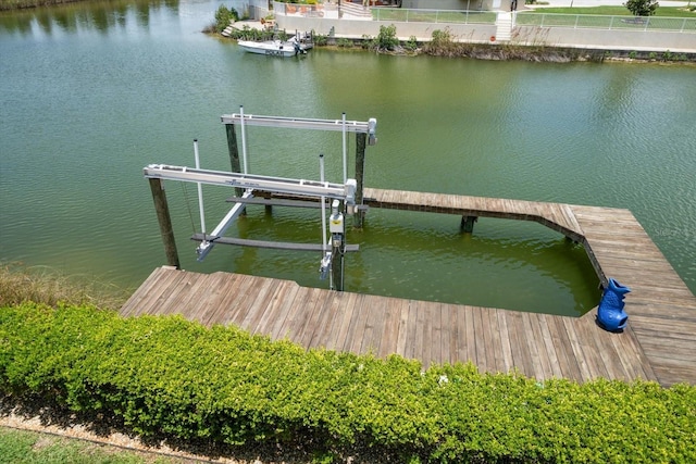 3397 Bluefish Dr, Hernando Beach, FL 34607 - dock area featuring boat lift and a water view