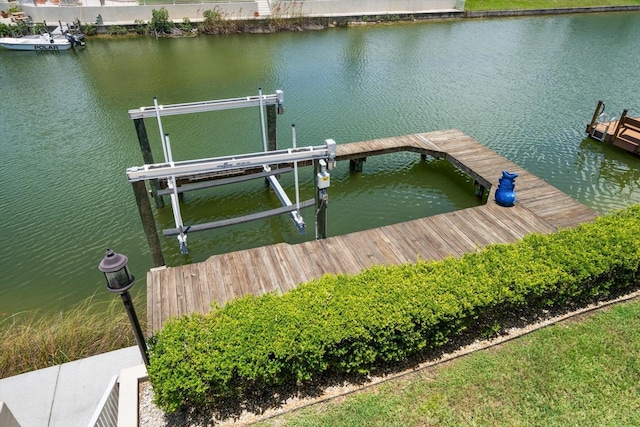 3397 Bluefish Dr, Hernando Beach, FL 34607 - dock featuring boat lift and a water view
