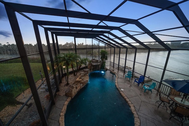 3397 Bluefish Dr, Hernando Beach, FL 34607 - outdoor pool featuring a patio area and glass enclosure
