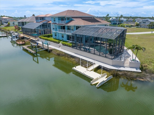 3397 Bluefish Dr, Hernando Beach, FL 34607 - dock with a water view, an outdoor pool, boat lift, and glass enclosure