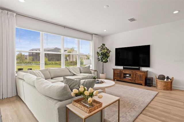 3541 Great Banyan Way, Wesley Chapel, FL 33543 - living room with light wood finished floors and recessed lighting