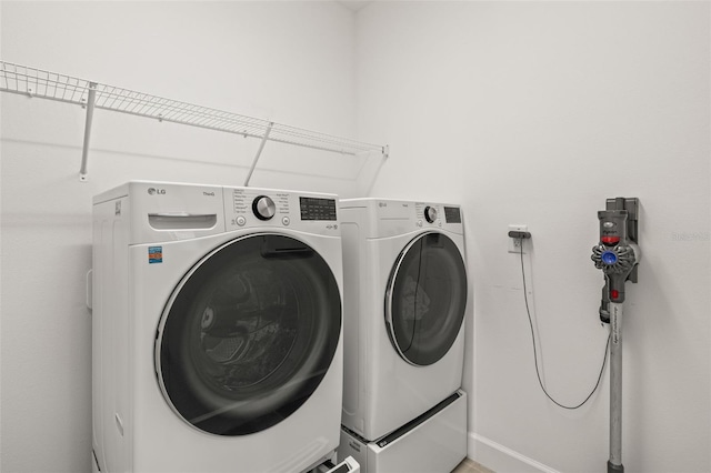 3541 Great Banyan Way, Wesley Chapel, FL 33543 - laundry area with washer and clothes dryer