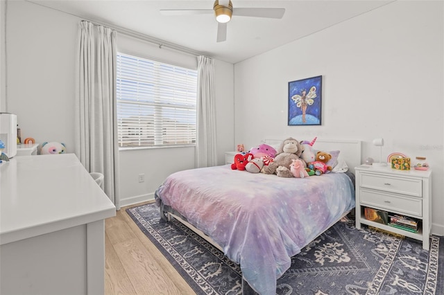3541 Great Banyan Way, Wesley Chapel, FL 33543 - bedroom with light wood-style flooring and ceiling fan