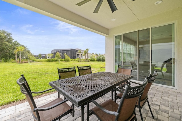 3541 Great Banyan Way, Wesley Chapel, FL 33543 - view of patio / terrace with a ceiling fan and outdoor dining area