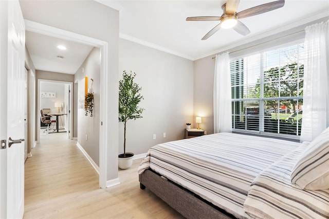10412 White Lake Ct, Tampa, FL 33626 - bedroom with light wood-type flooring, baseboards, ornamental molding, recessed lighting, and ceiling fan
