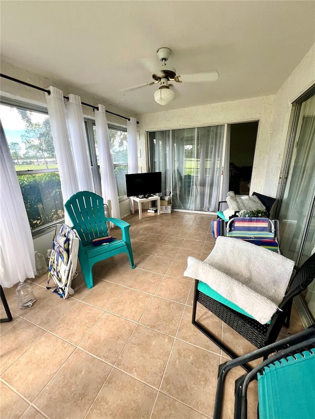 3725 Teeside Dr, New Port Richey, FL 34655 - sunroom featuring a ceiling fan