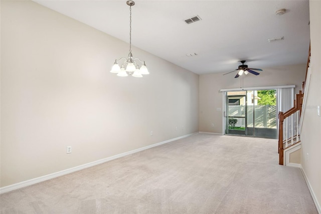 31215 Flannery Ct, Wesley Chapel, FL 33543 - empty room with light colored carpet, baseboards, a chandelier, ceiling fan, and a smoke detector