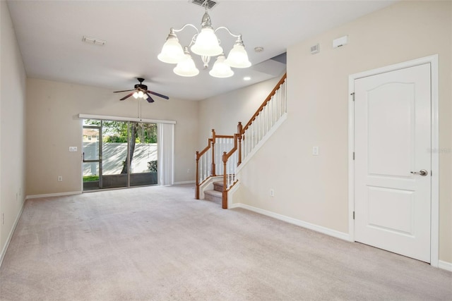 31215 Flannery Ct, Wesley Chapel, FL 33543 - unfurnished living room with stairs, a chandelier, carpet flooring, and baseboards
