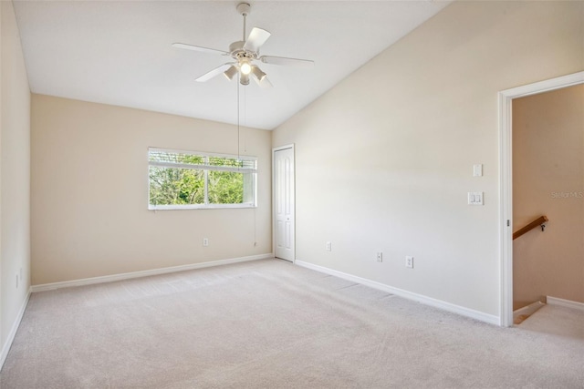 31215 Flannery Ct, Wesley Chapel, FL 33543 - spare room with carpet flooring, baseboards, ceiling fan, and lofted ceiling