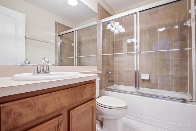31215 Flannery Ct, Wesley Chapel, FL 33543 - bathroom with combined bath / shower with glass door, toilet, and vanity
