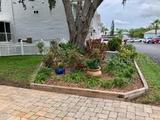 2015 Vista Del Sol Unit 108, Lutz, FL 33558 - view of yard featuring a garden