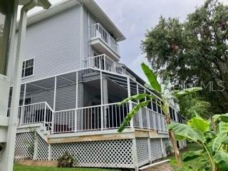 2015 Vista Del Sol Unit 108, Lutz, FL 33558 - rear view of house with stairway